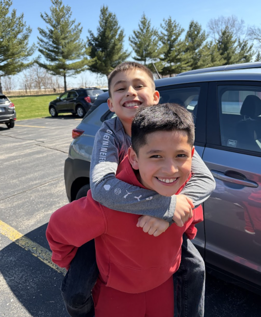 Students outside enjoying the weather for Arbor Day