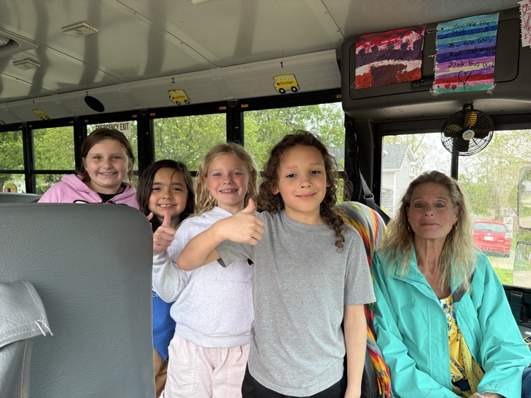 bus driver with student presenting flowers as a gift 3