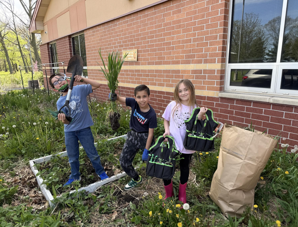 Students working in the community garden