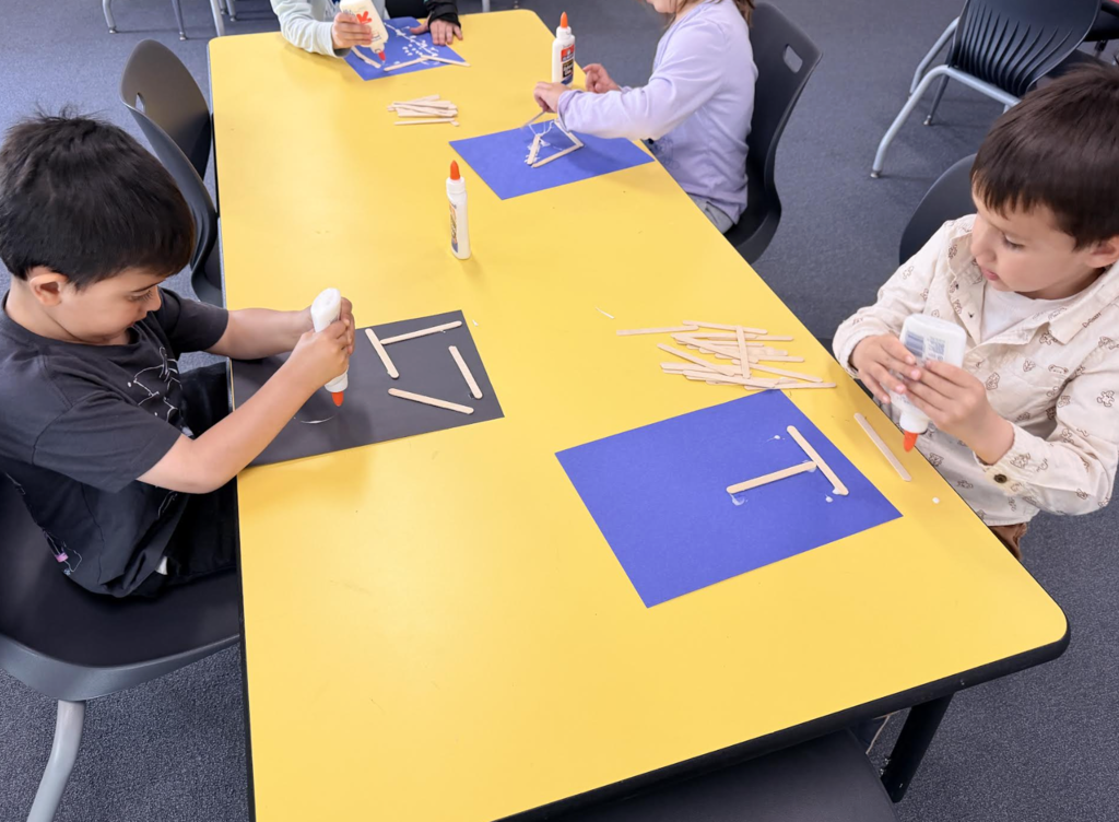 Students in 4k building their houses 3
