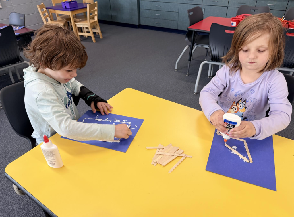 Students in 4k building their houses 2
