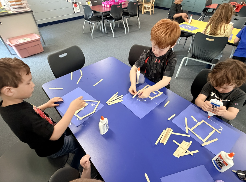 Students in 4k building their houses 6