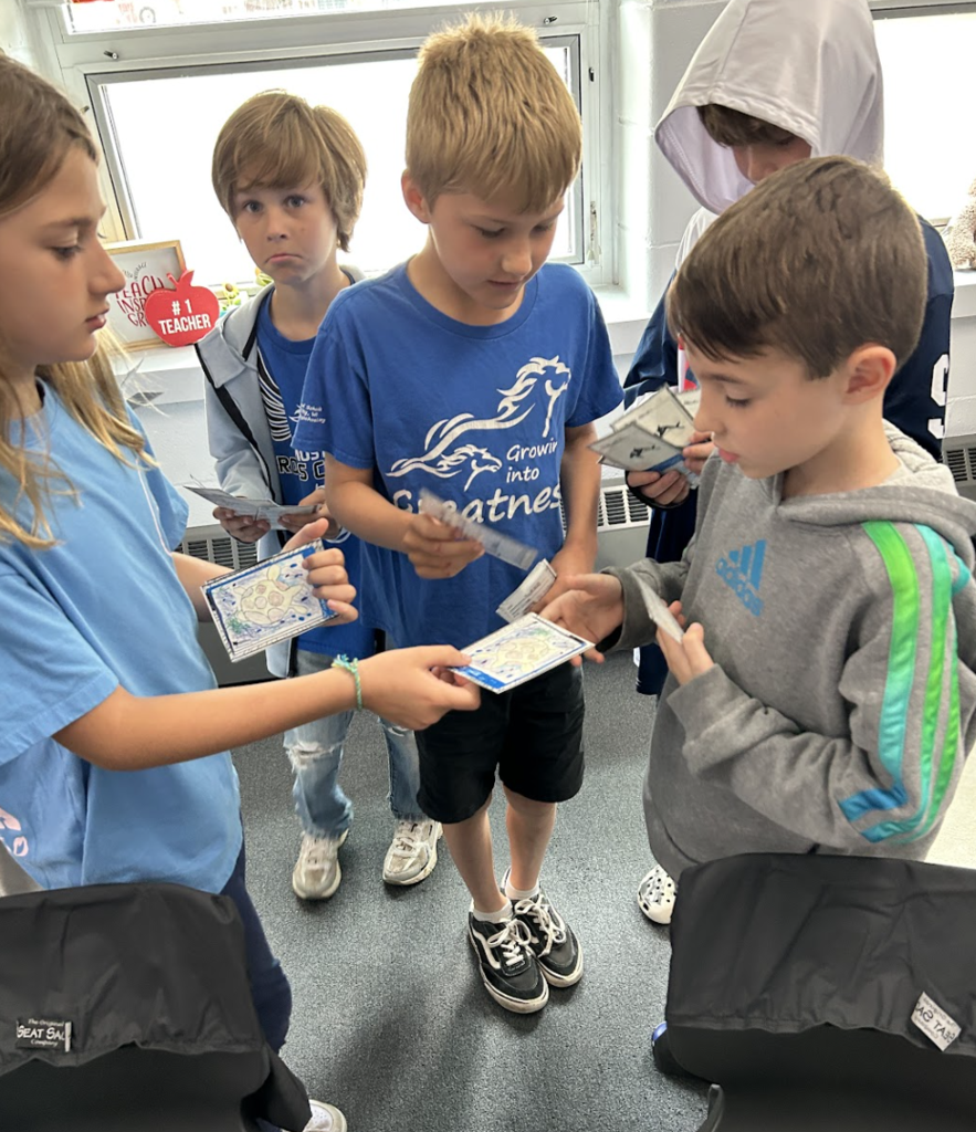 3rd graders sharing their projects