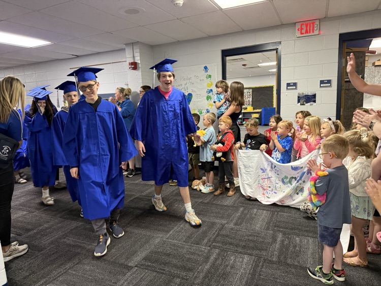 8th graders walking through hallways at BES 1
