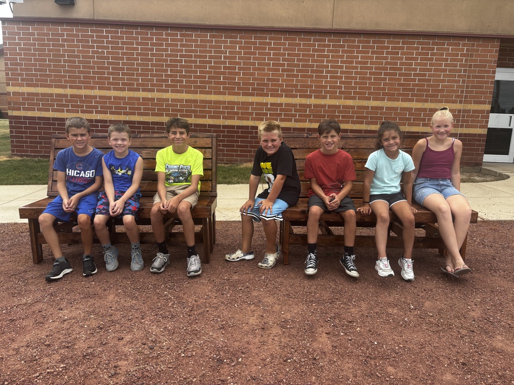 Students with benches at BMS