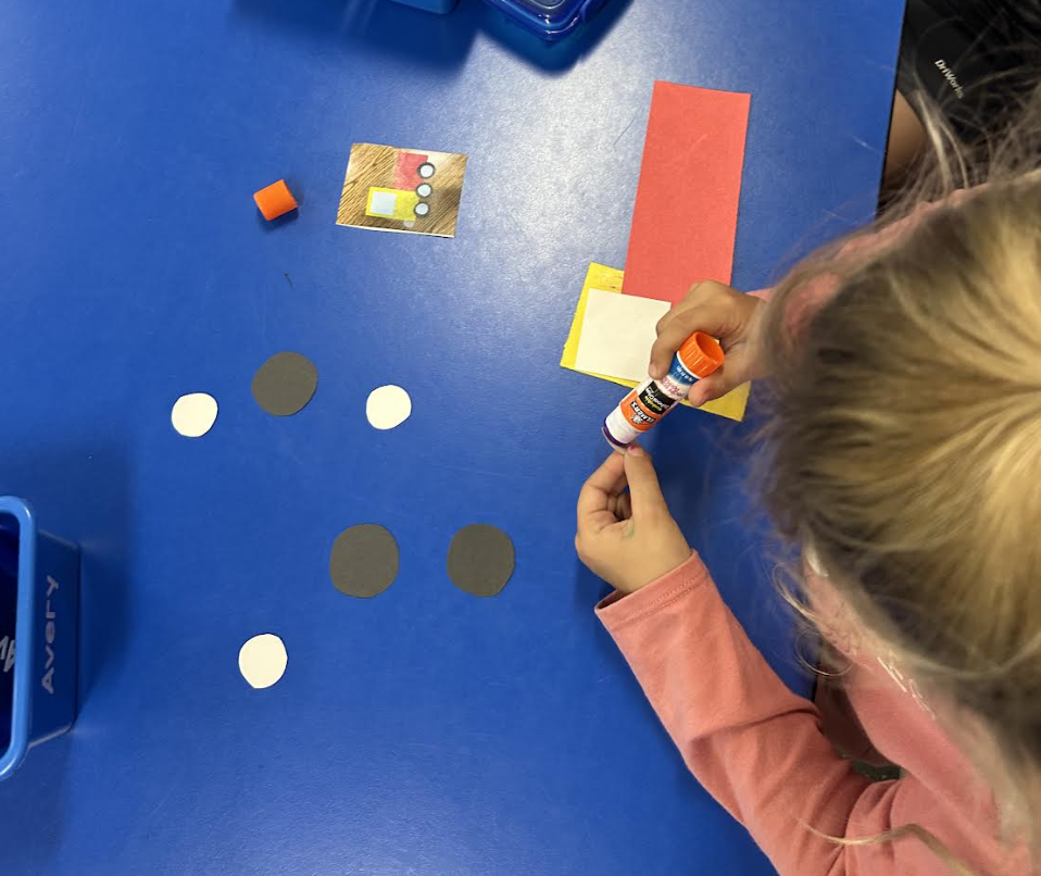 5K student working on shapes