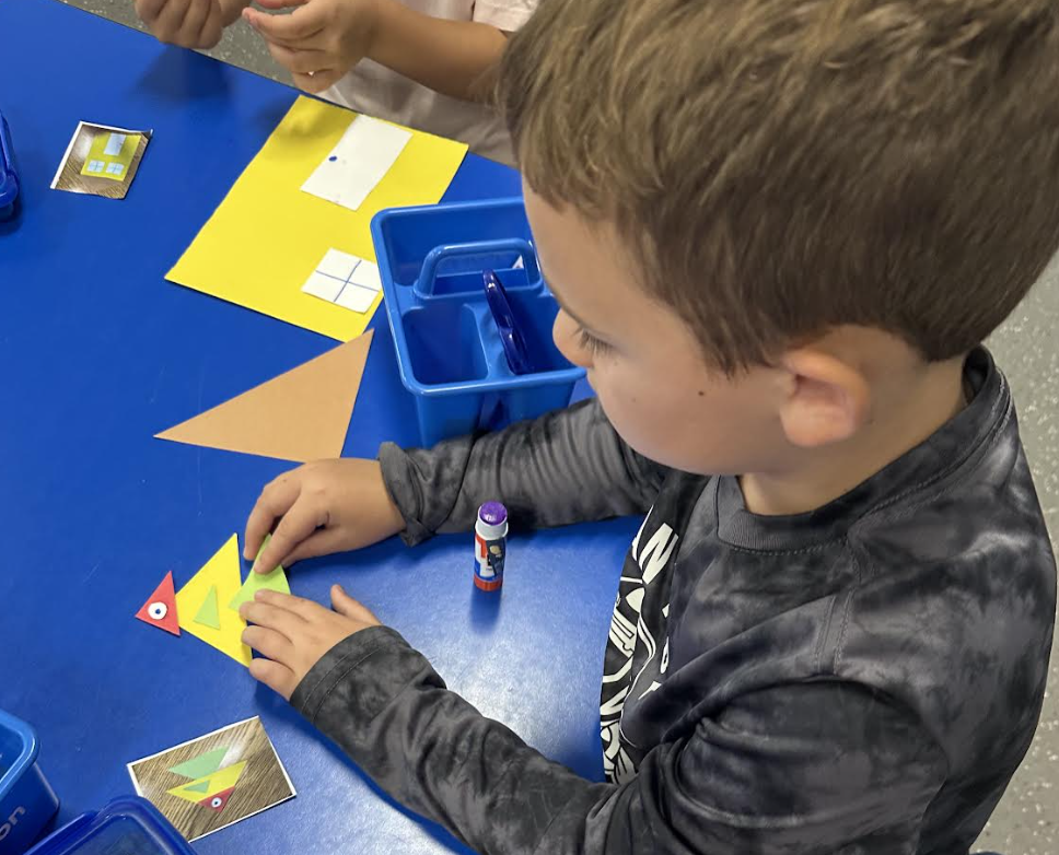 5K student working on shapes