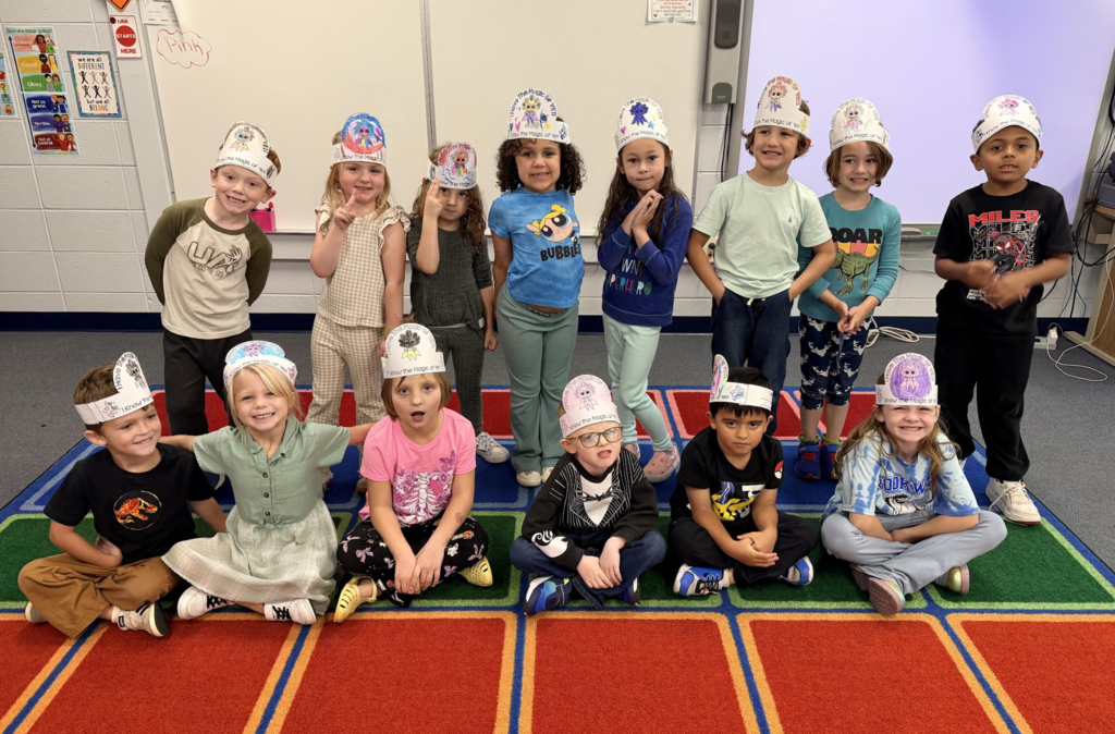 Kindergarten students with Power or Yet hats from guidance class