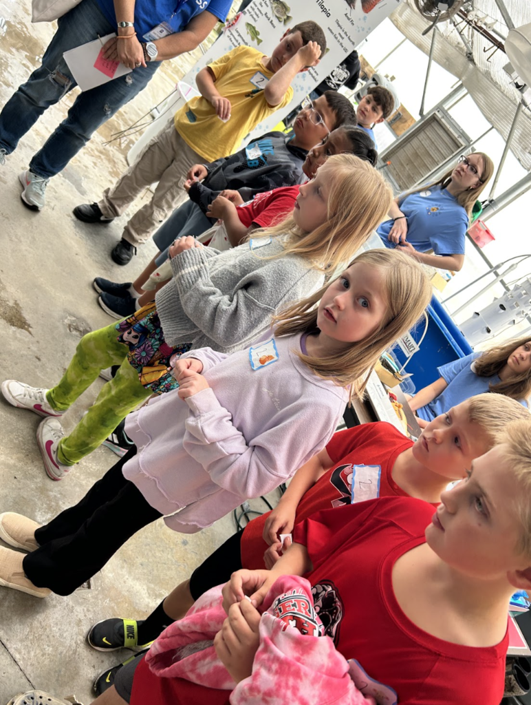 3rd graders at Ag Day at Badger learning from FAA