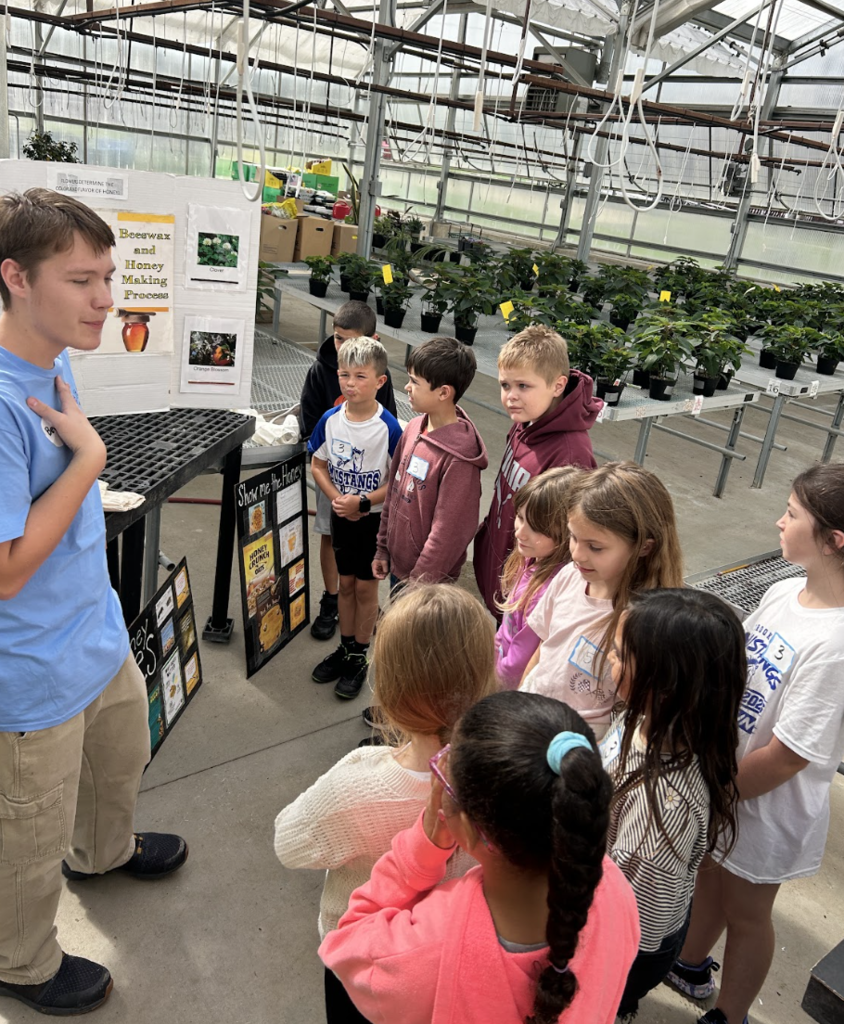 Students learning from FAA Badger student