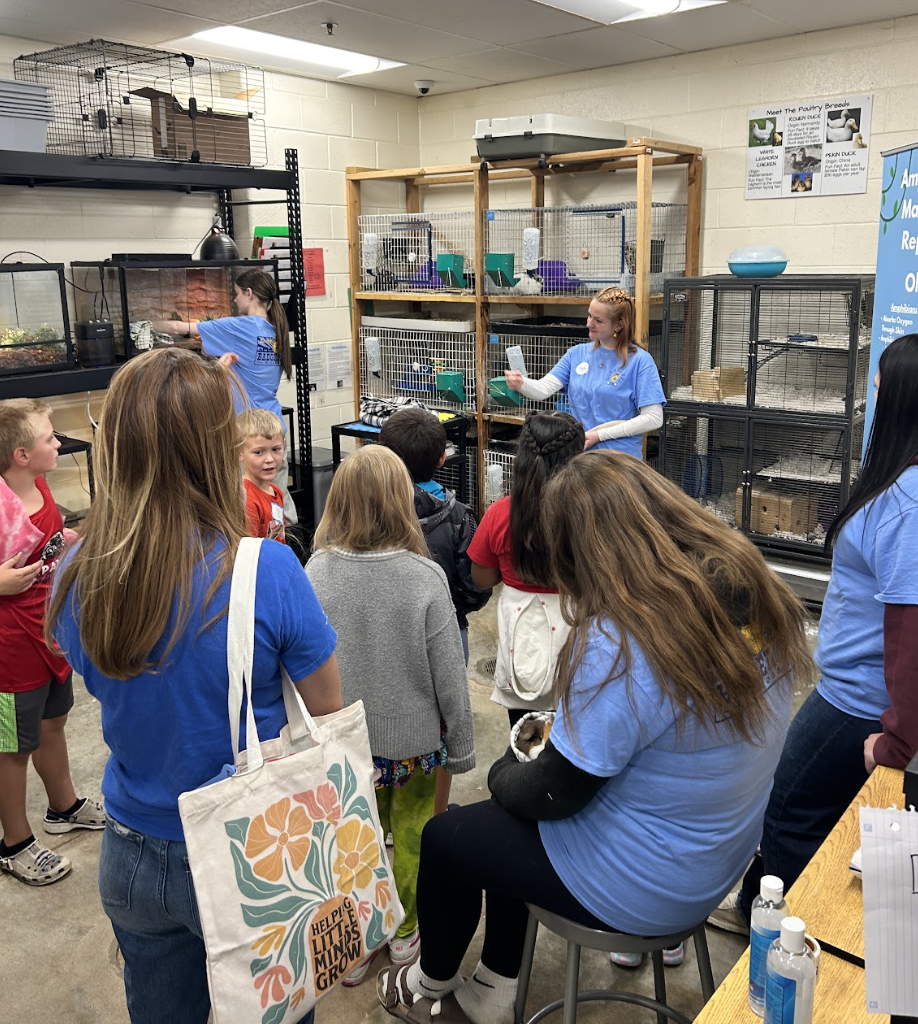 3rd graders learning at Ag Day at Badger from FAA