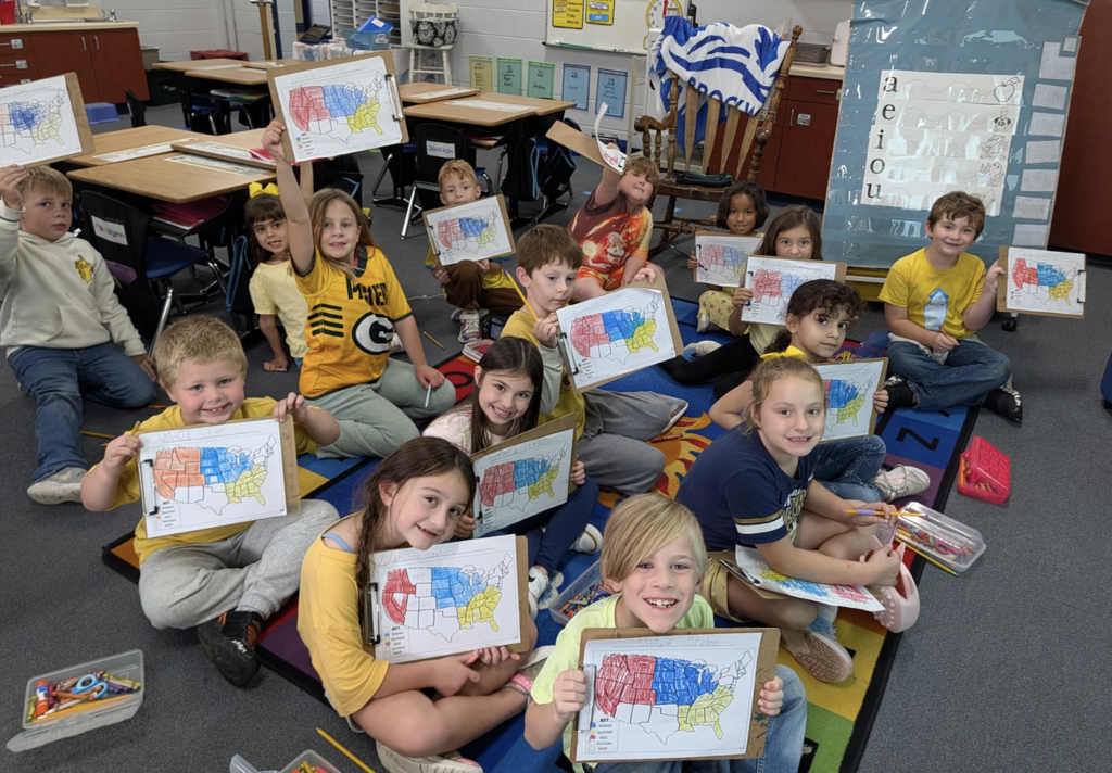 First Graders Showing Their USA Maps