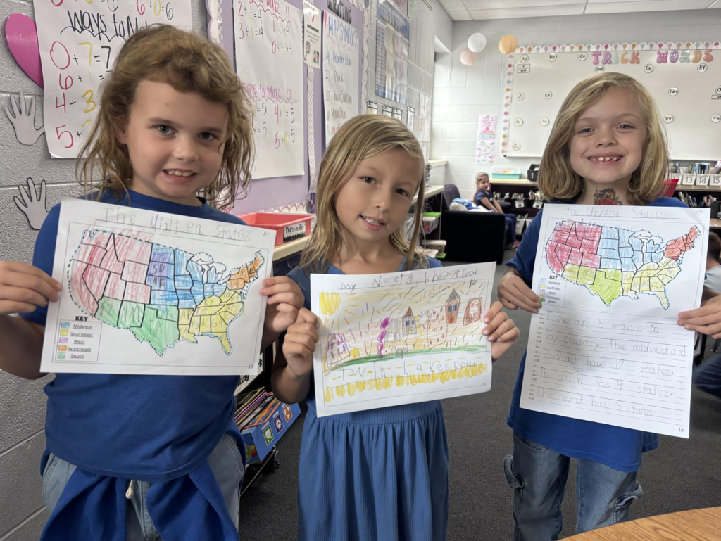 First Graders Showing Their USA and City Work