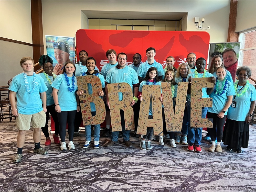 Students with Brave sign