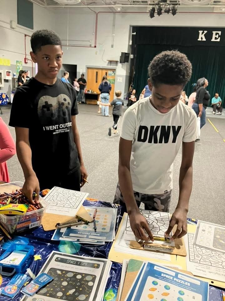 2 Students at table