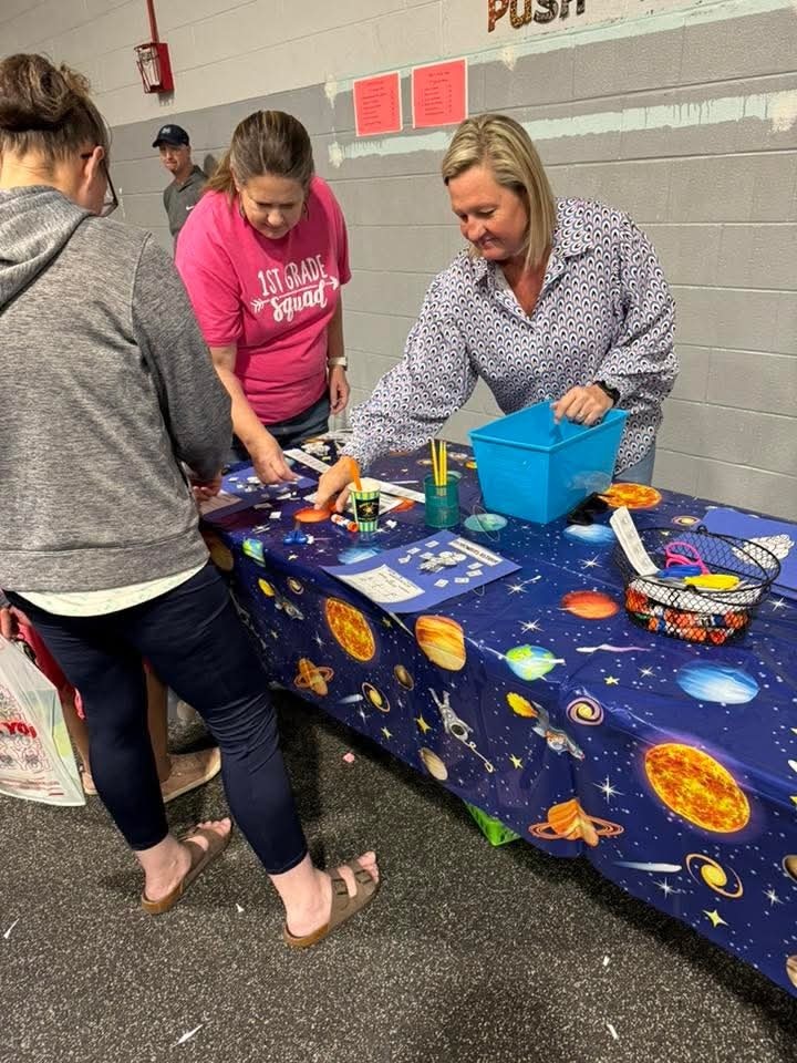 Teachers at game table