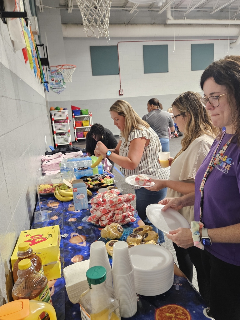 Staff fixing breakfast
