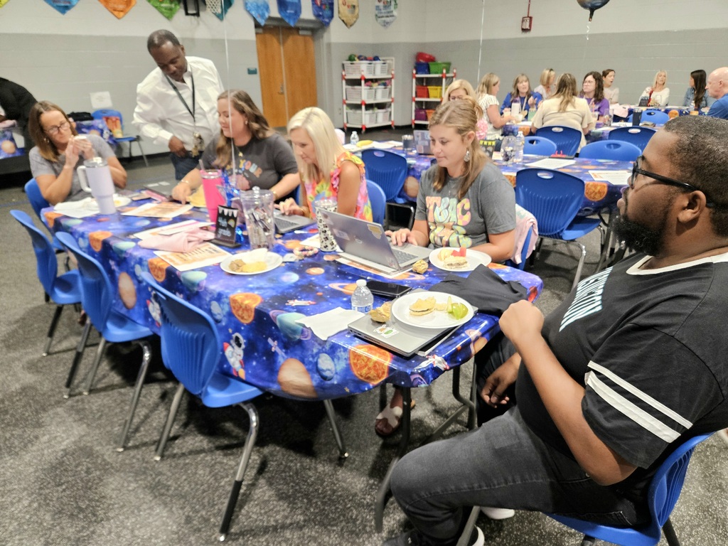 4th Grade teachers at table