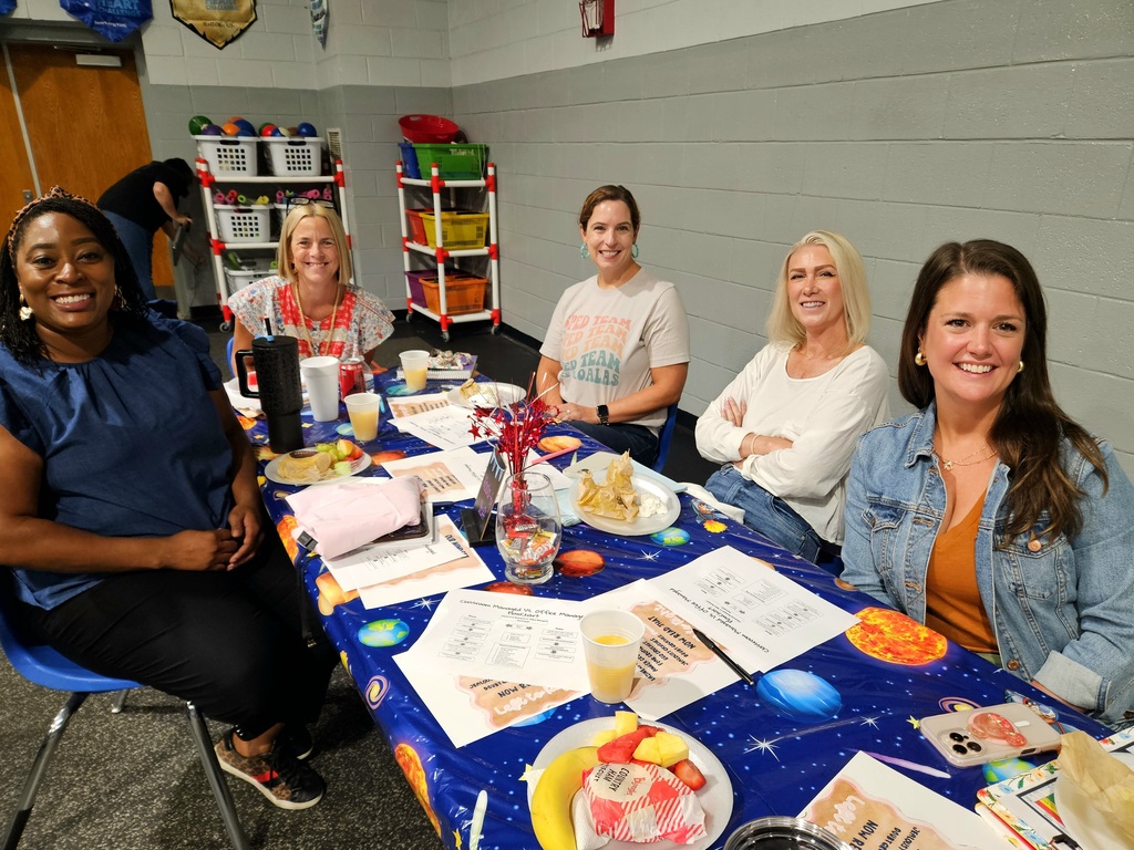 Special Services team sitting at table