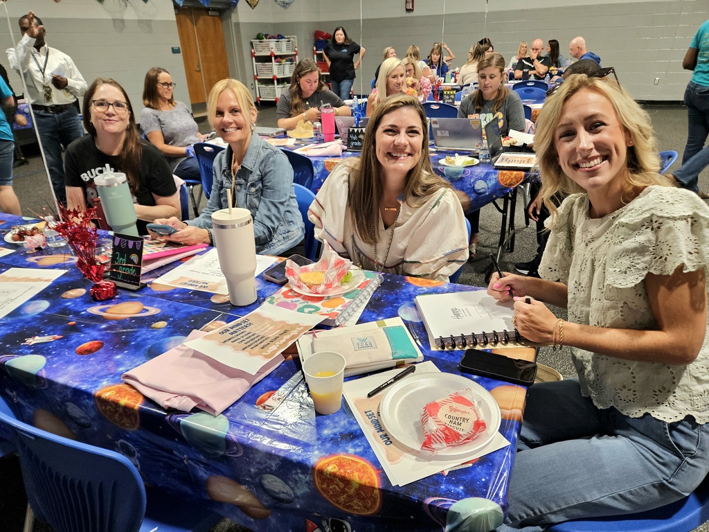 3rd Grade team sitting at table