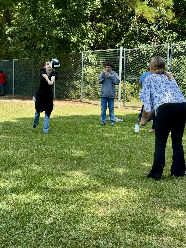 girls playing with volleyball