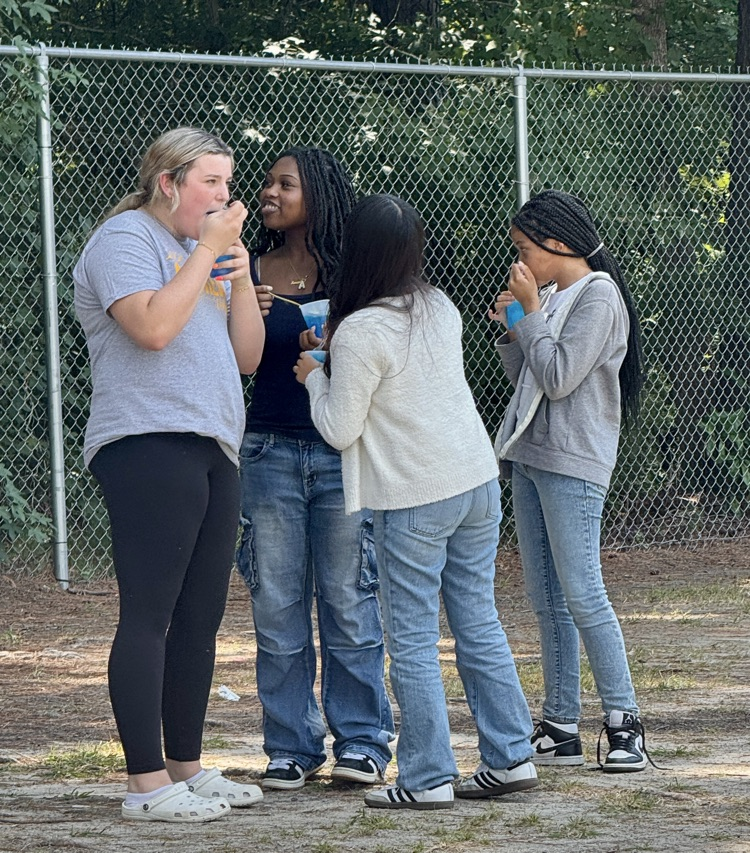 girls enjoying snow cones