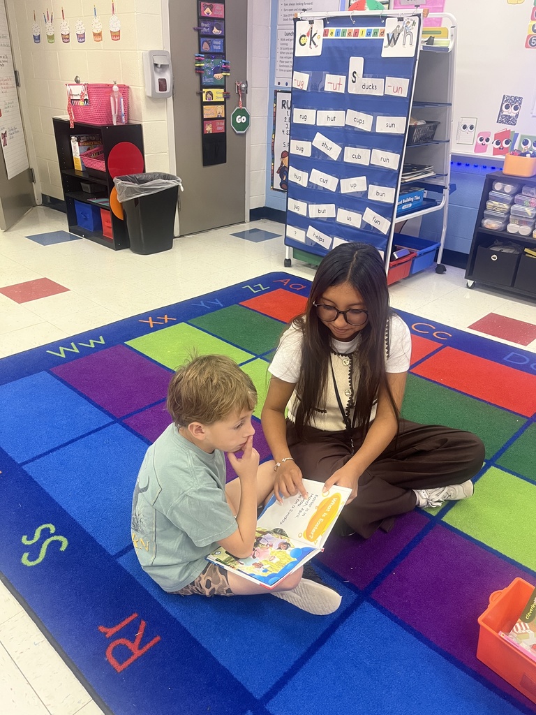 Teacher Cadet with students