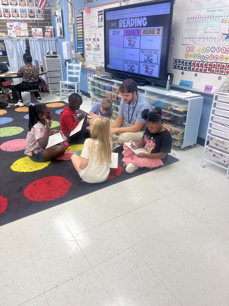 Teacher Cadet with students
