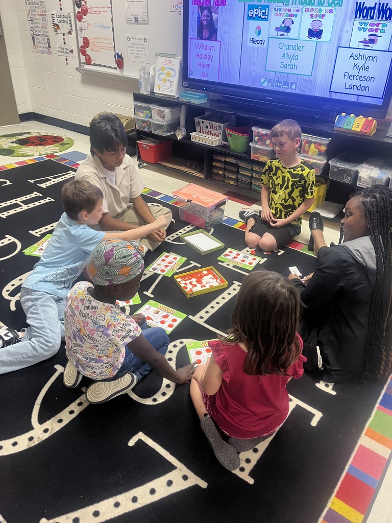Teacher Cadet with students
