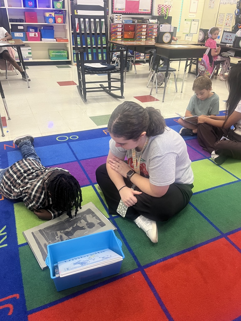 Teacher Cadet with students