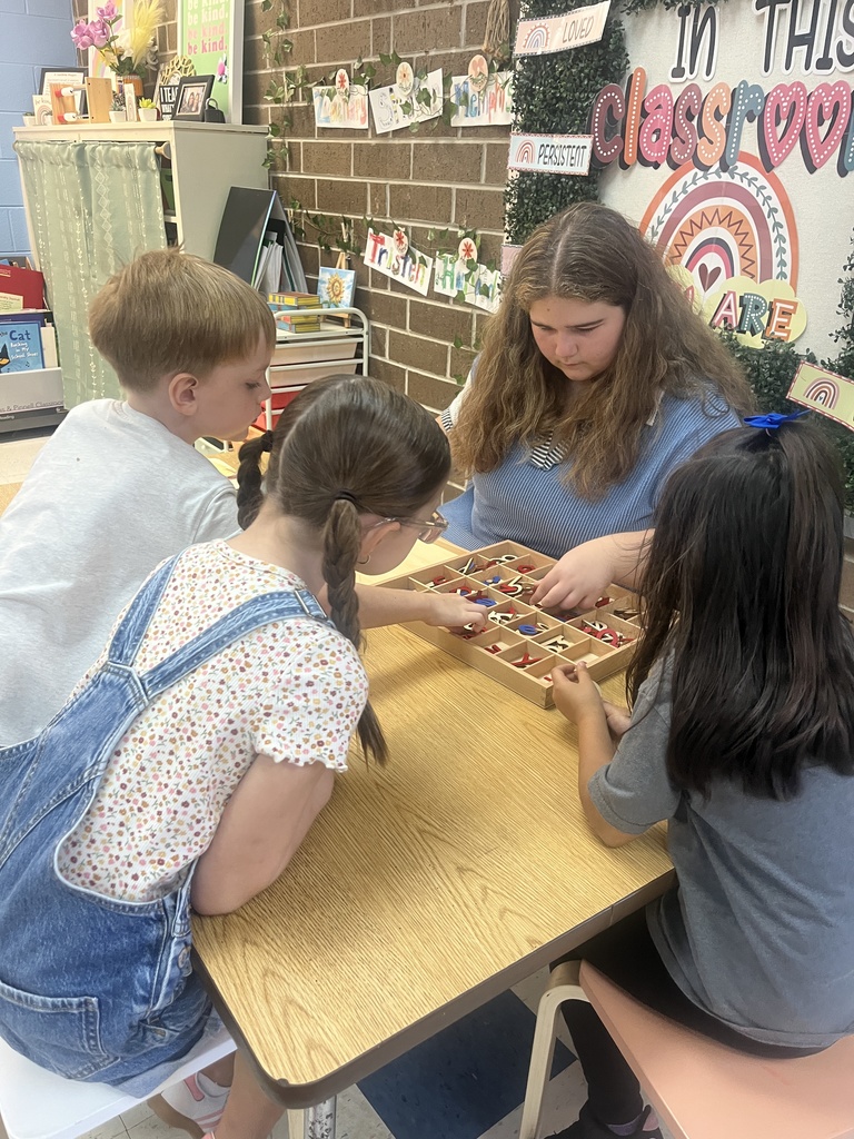 Teacher Cadet with students