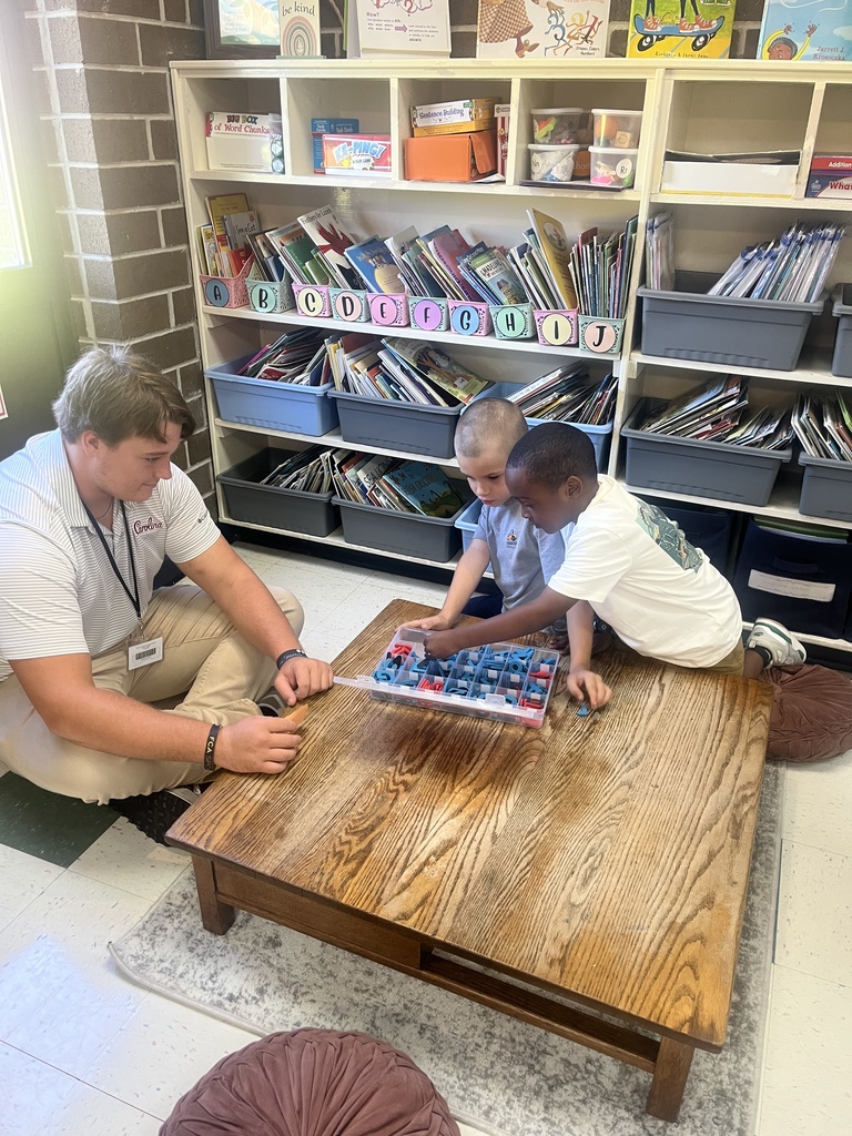 Teacher Cadet with students