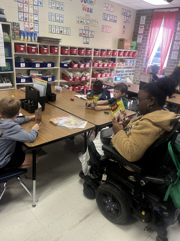 Teacher Cadet with students