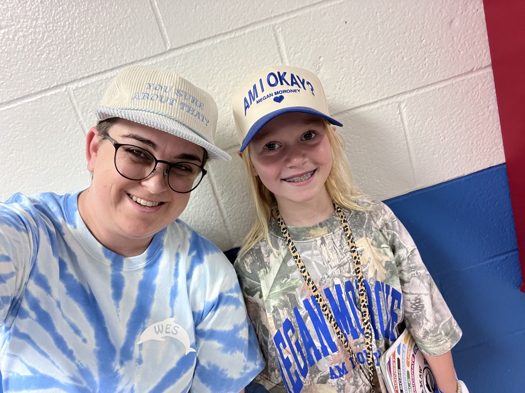 Teacher and student taking a selfie.