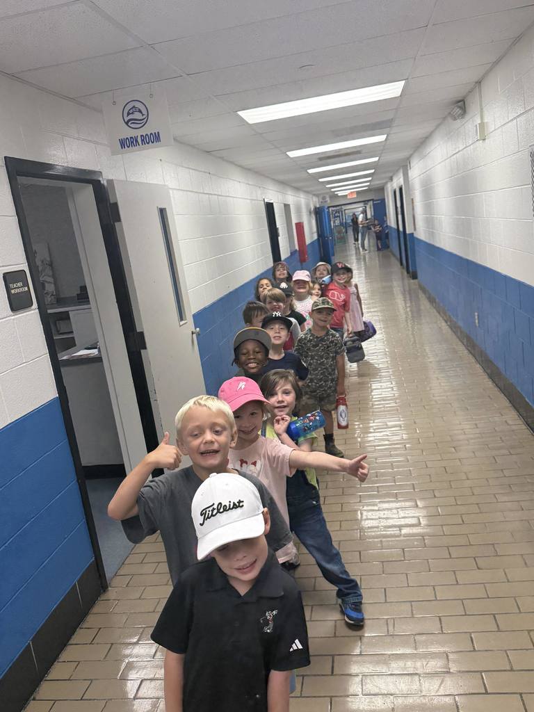 Students lined up in the hallway.