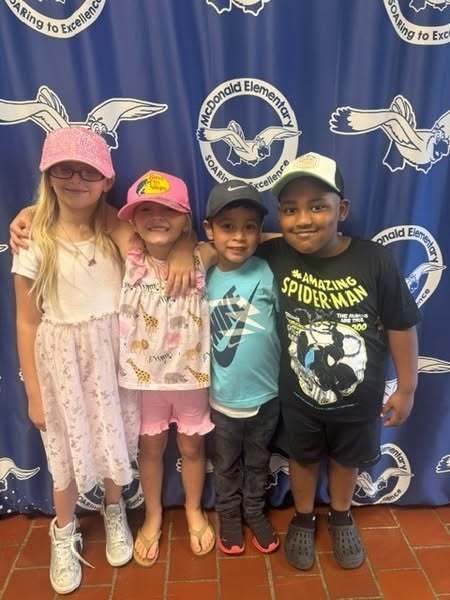 MES students wearing hats for Kidz in Lids fundraiser.