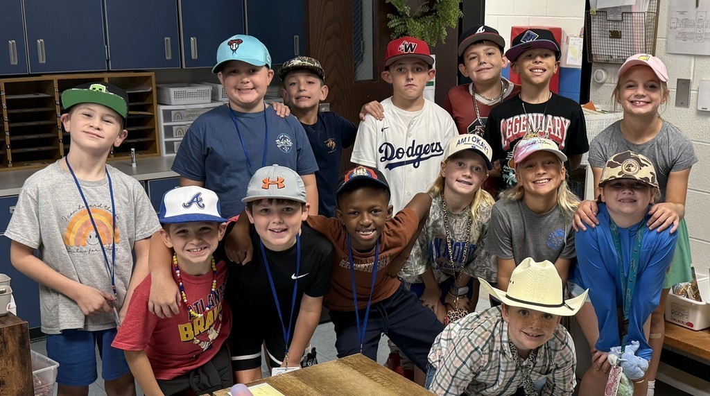 WES students wearing hats for Kidz in Lids fundraiser.