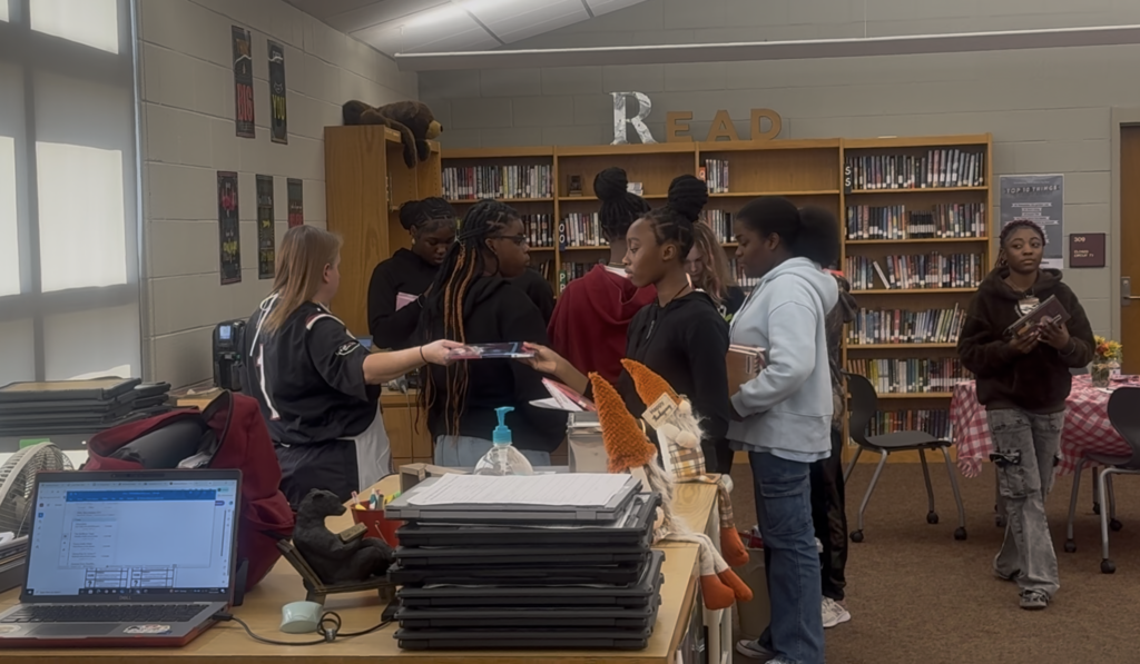 Students checking their books out!!