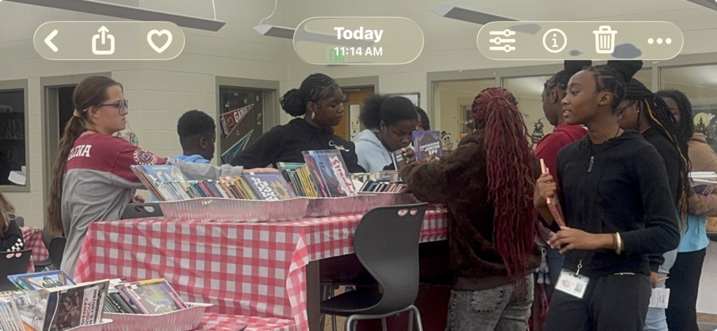 Students sampling new books on the Book Buffet!