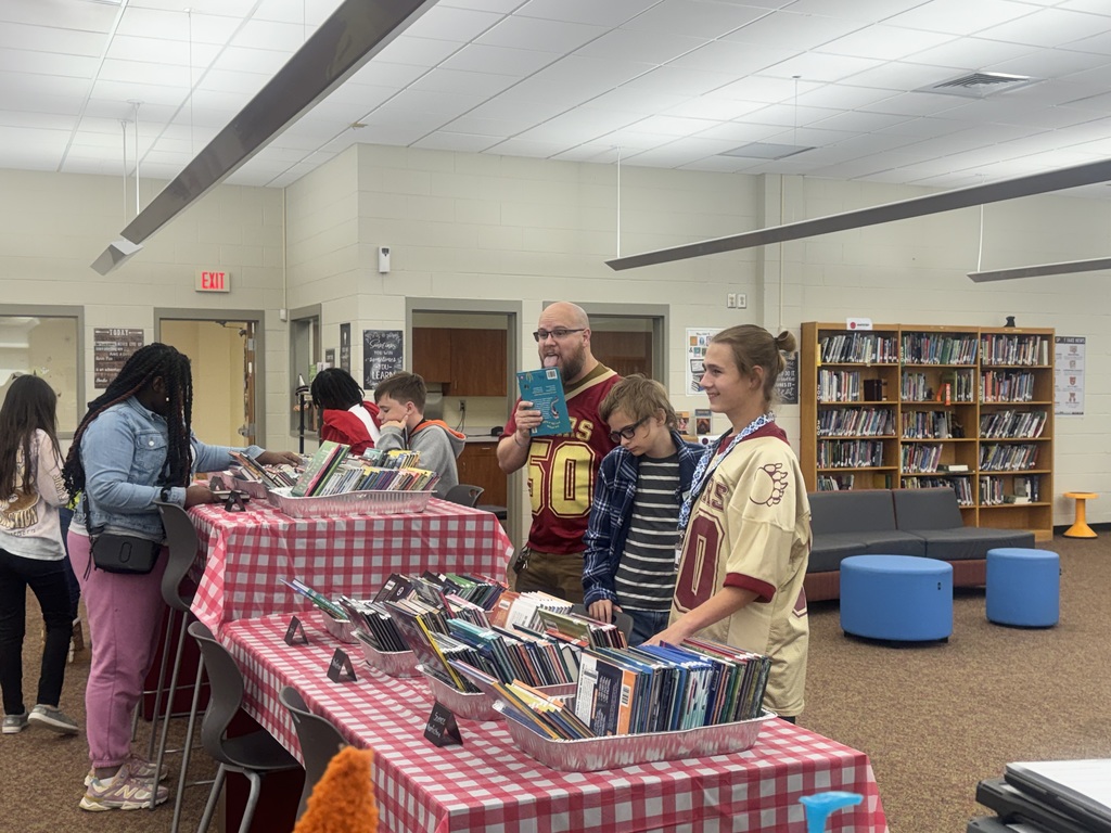 Dr. Poston took the Book Tasting literally!!