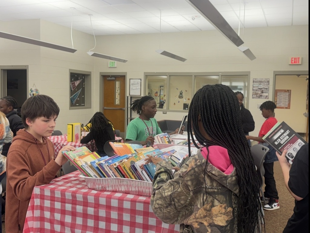 Kids choosing books at the Bear Book Buffet!
