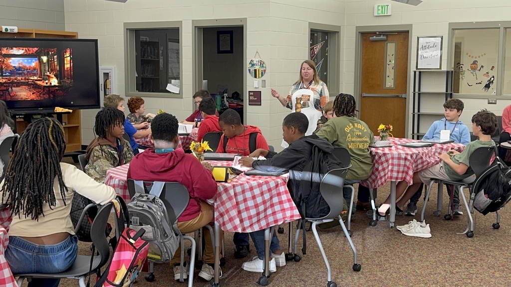 Mrs. Smith explaining the Bear Book Buffet.