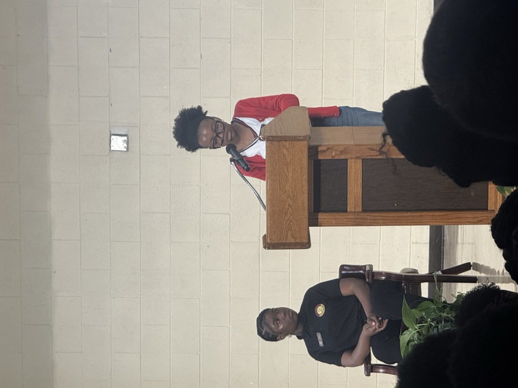 Student giving speech during Veterans Day Parade.