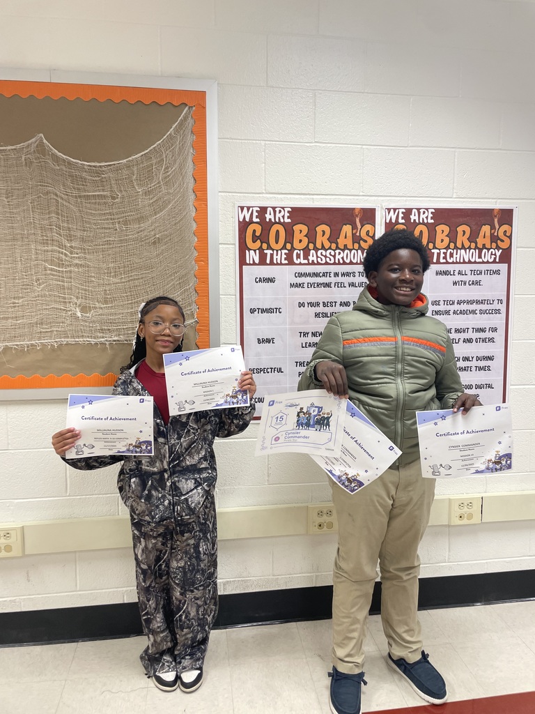 6th graders Milliuana Hudson and Cynsier Commander