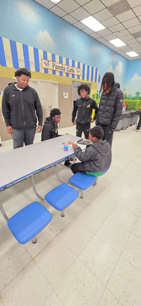 Football Player visits AES