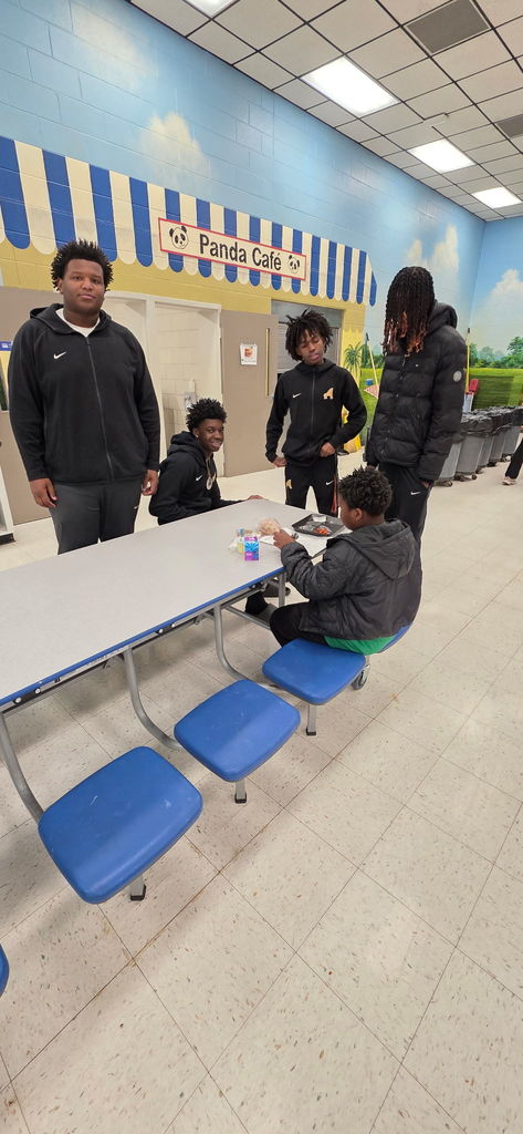 Football Player visits AES