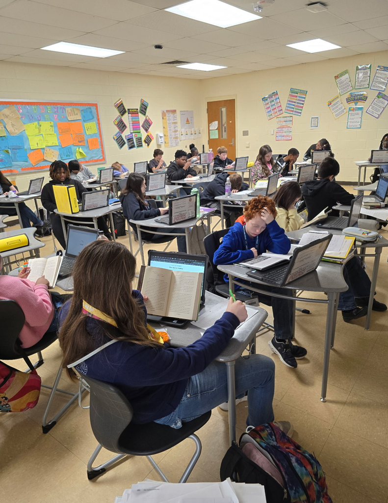 Carvers Bay Middle students are reading during the Read Across Georgetown Day.