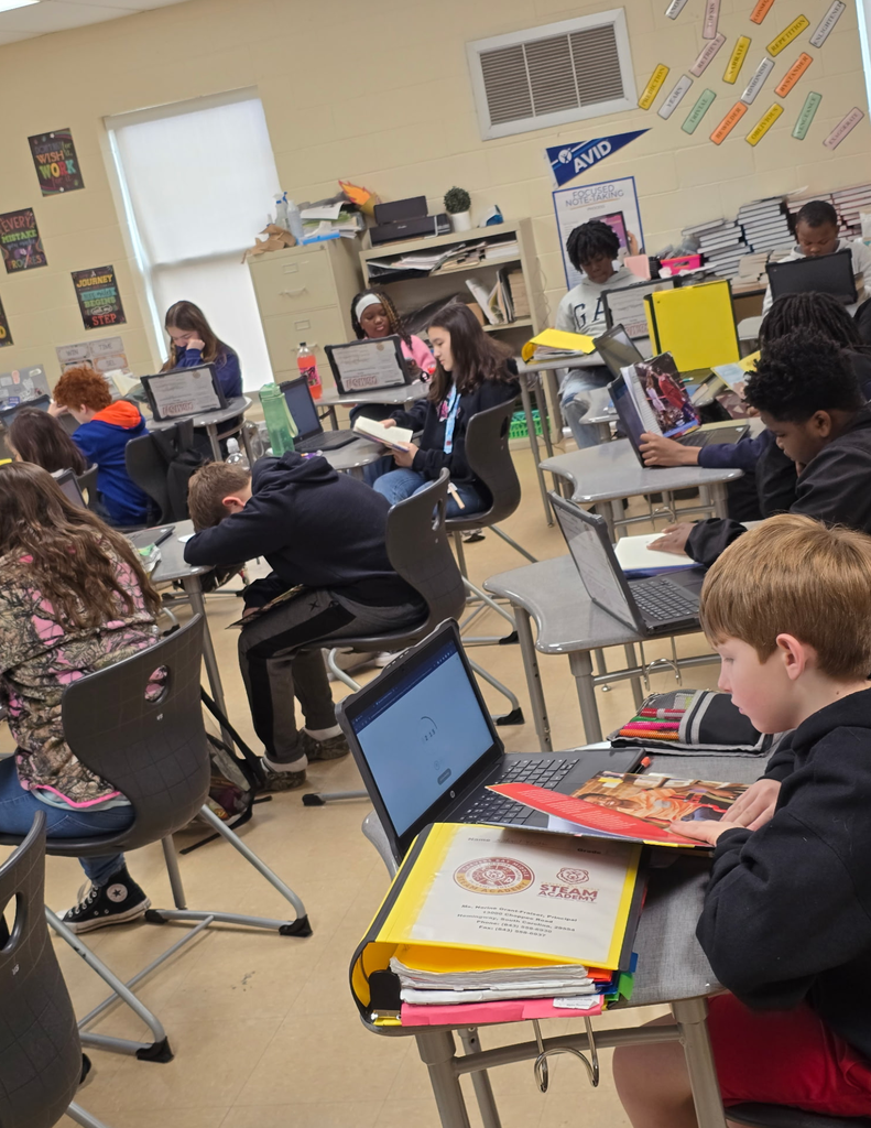 Carvers Bay Middle students are reading during the Read Across Georgetown Day.