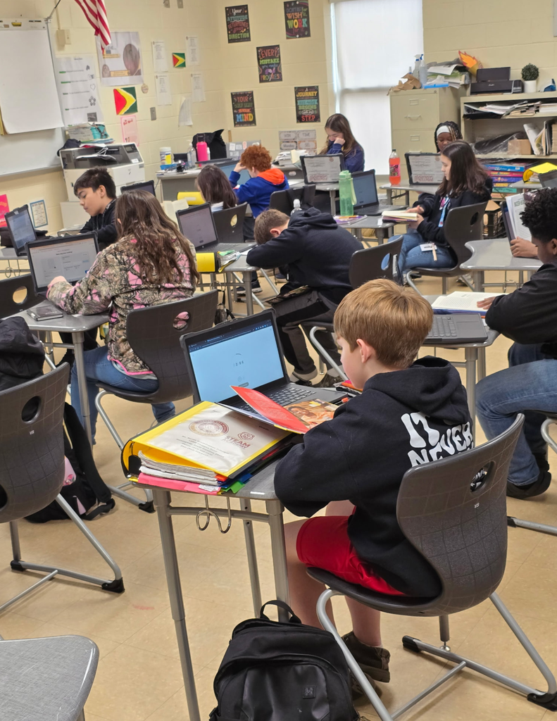 Carvers Bay Middle students are reading during the Read Across Georgetown Day.