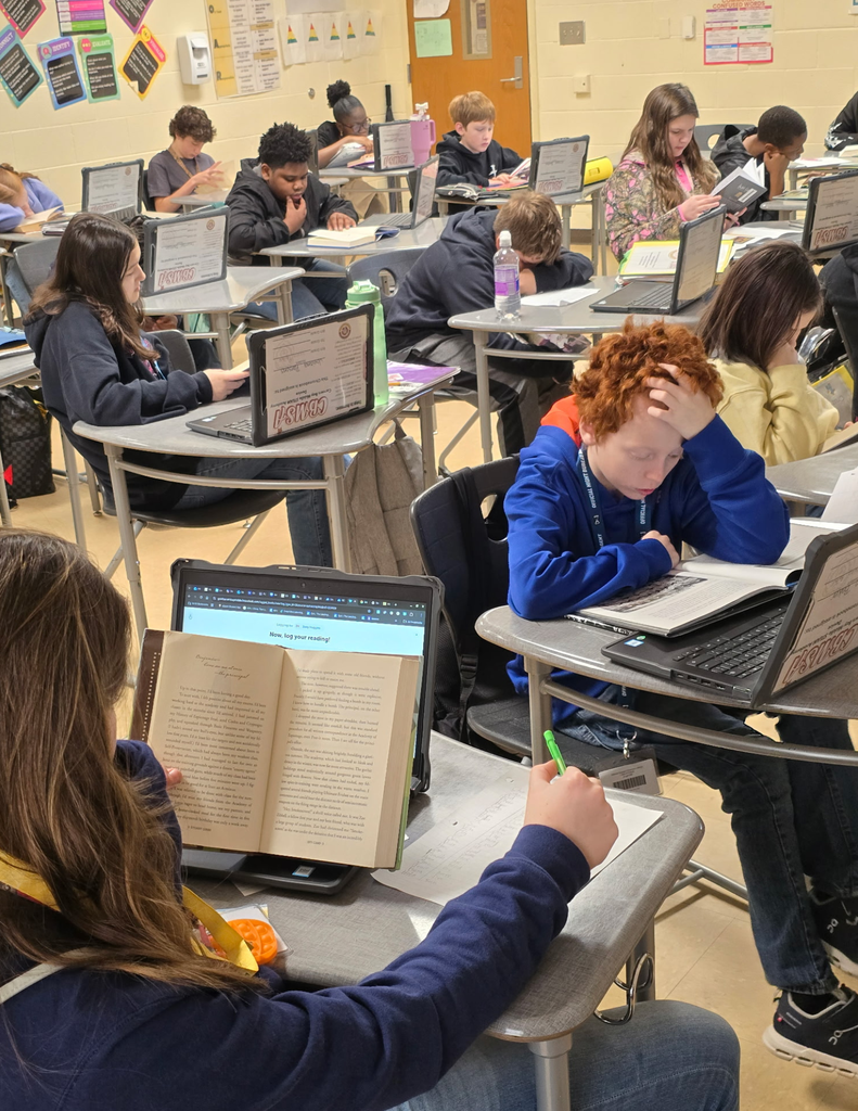 Carvers Bay Middle students are reading during the Read Across Georgetown Day.
